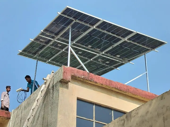 Solar panels installed above a building rooftop